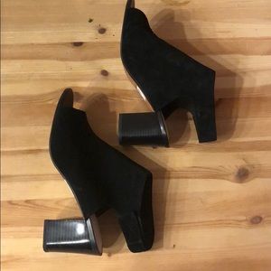 Clark’s black suede mules